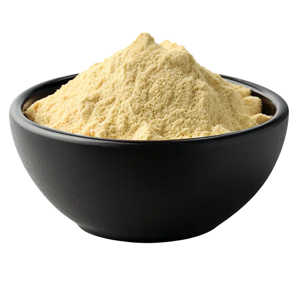 Gelbes Pulver in einer schwarzen Schüssel.