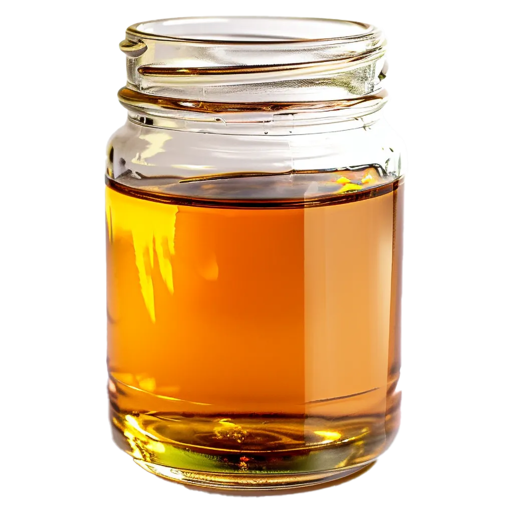 Ein Glas mit bernsteinfarbenem Flüssigkeit.