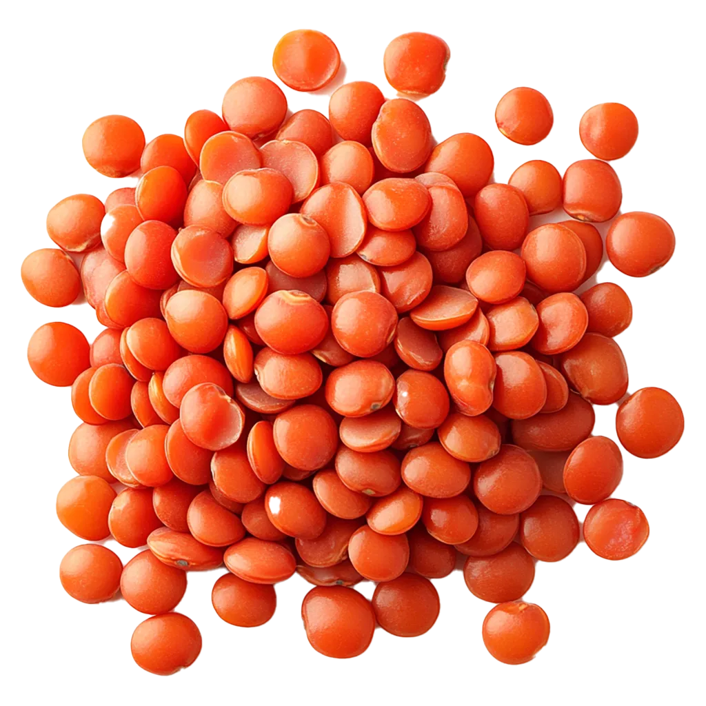 Ein Haufen roter Linsen auf schwarzem Hintergrund.